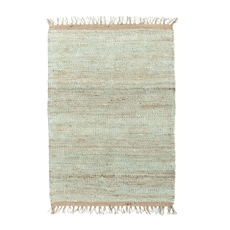 Handwoven Jute Rug: Natural & Rustic texture with frayed edges and subtle light blue and tan stripes.